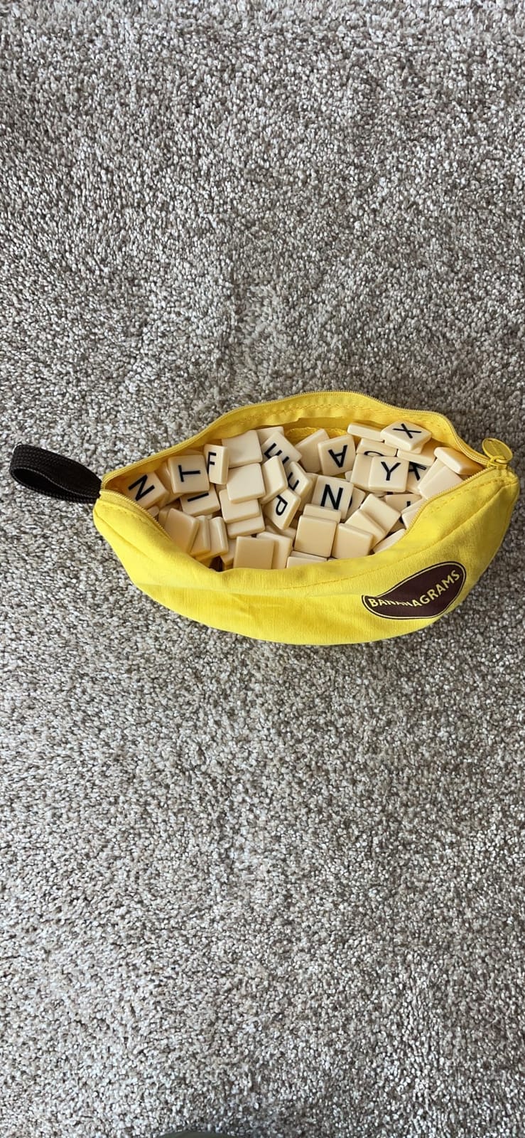 Bananagrams Classic Word Game, 144 Tiles in Banana Pouch, Travel Game customer photo 1