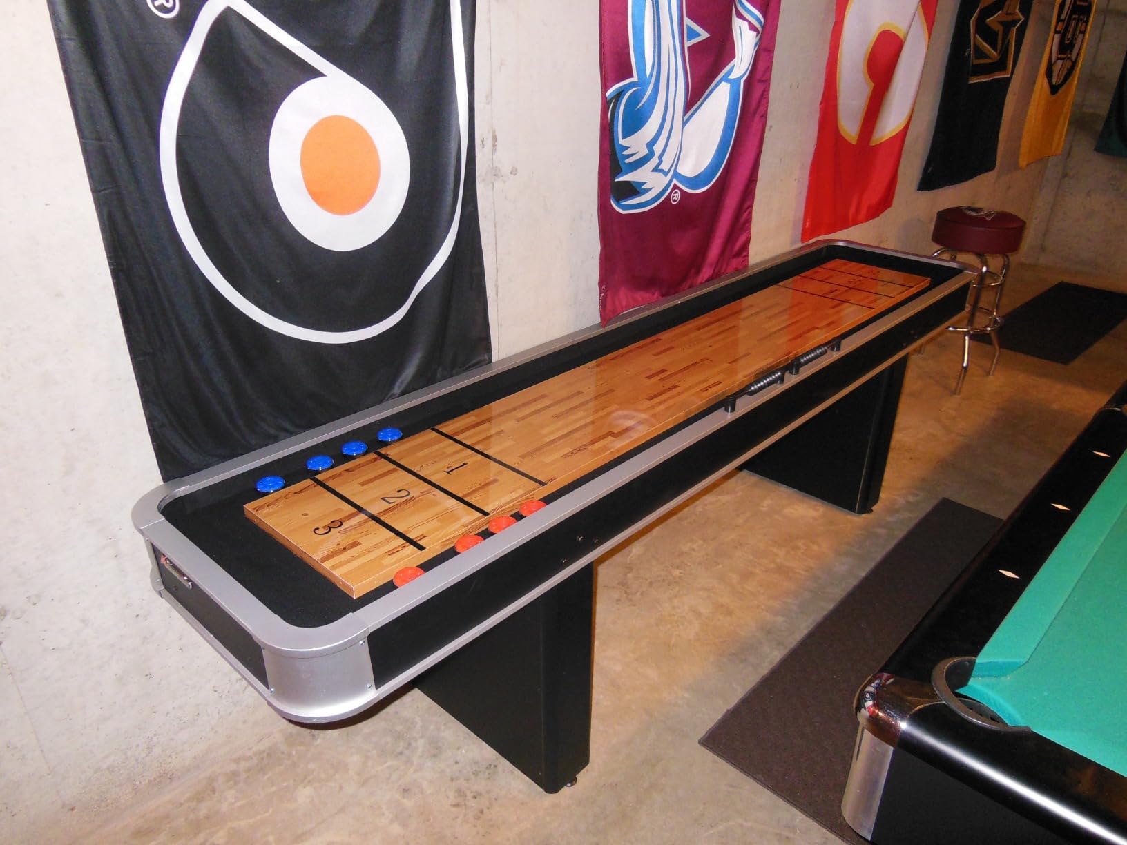 Atomic 9’ LED Shuffleboard Tables with Poly-Coated Playing Surface for Smooth, Fast Puck Action and Pedestal Legs with Levelers for Optimum Stability and Level Play customer photo 1