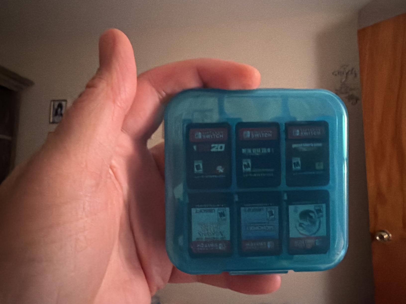 Amazon Basics Portable Game Storage Case for 24 Nintendo Switch Games, Game Card Slots, 3.4 x 3.4 x 1 Inches, Blue customer photo 2