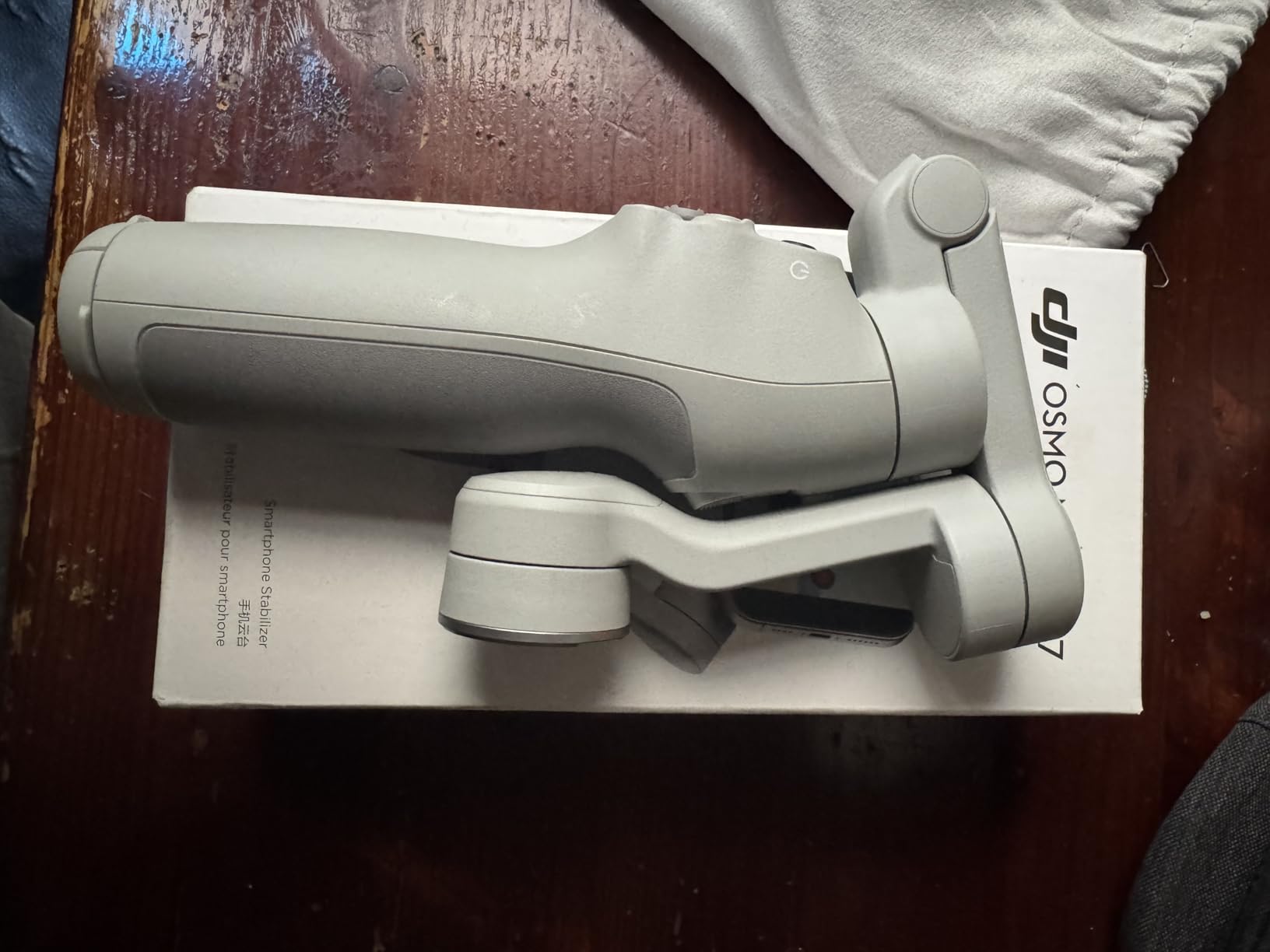 DJI Osmo Mobile 7 Gimbal Stabilizer for iPhone & Android, 3-Axis Gimbal | Built-in Tripod, Ultra-Light, Comfortable Grip, ActiveTrack, ShotGuides, One-Tap Edit, 10hrs Use, Phone Charging customer photo 2
