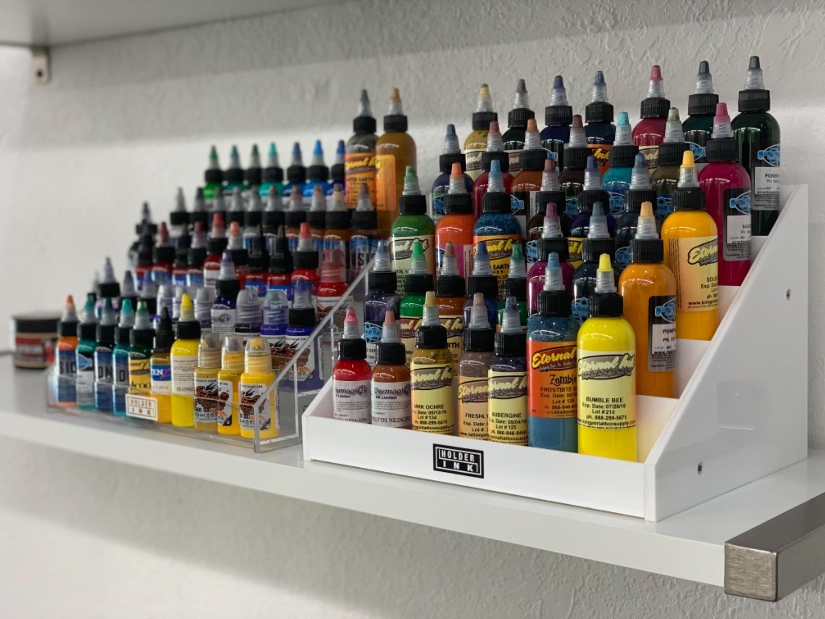 acrylic display stand organizer for tattoo inks, nail polish bottles and other beauty essentials that keeps them organized, secured and ready to use. customer photo 1