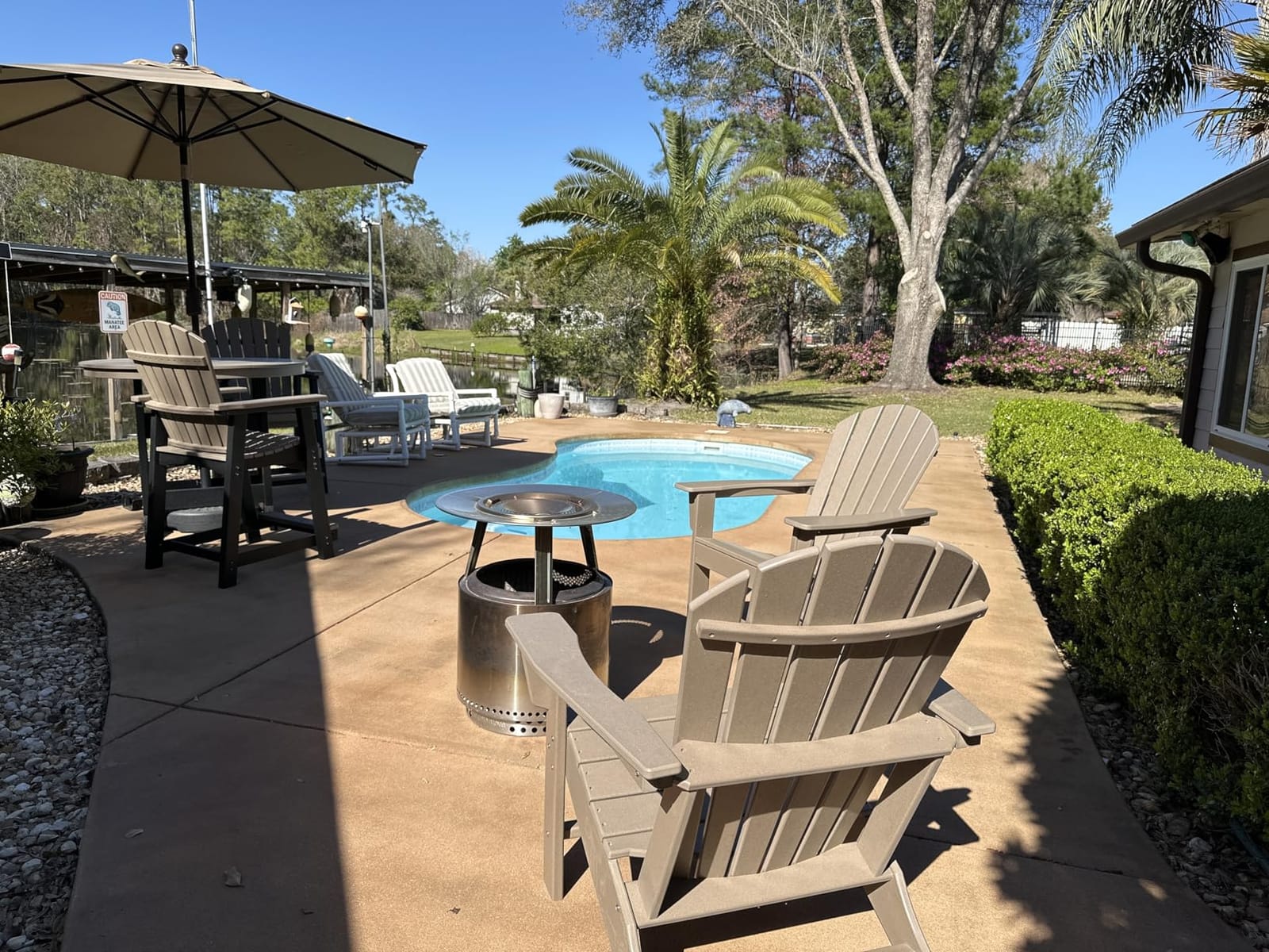 Signature Design by Ashley 1-Piece HDPE Outdoor Adirondack Chair, Driftwood | Durable weather resistant HDPE, 36-pound stationary frame, Comfortable 16.25-inch elevated seat, Sundown Treasure Series customer photo 1