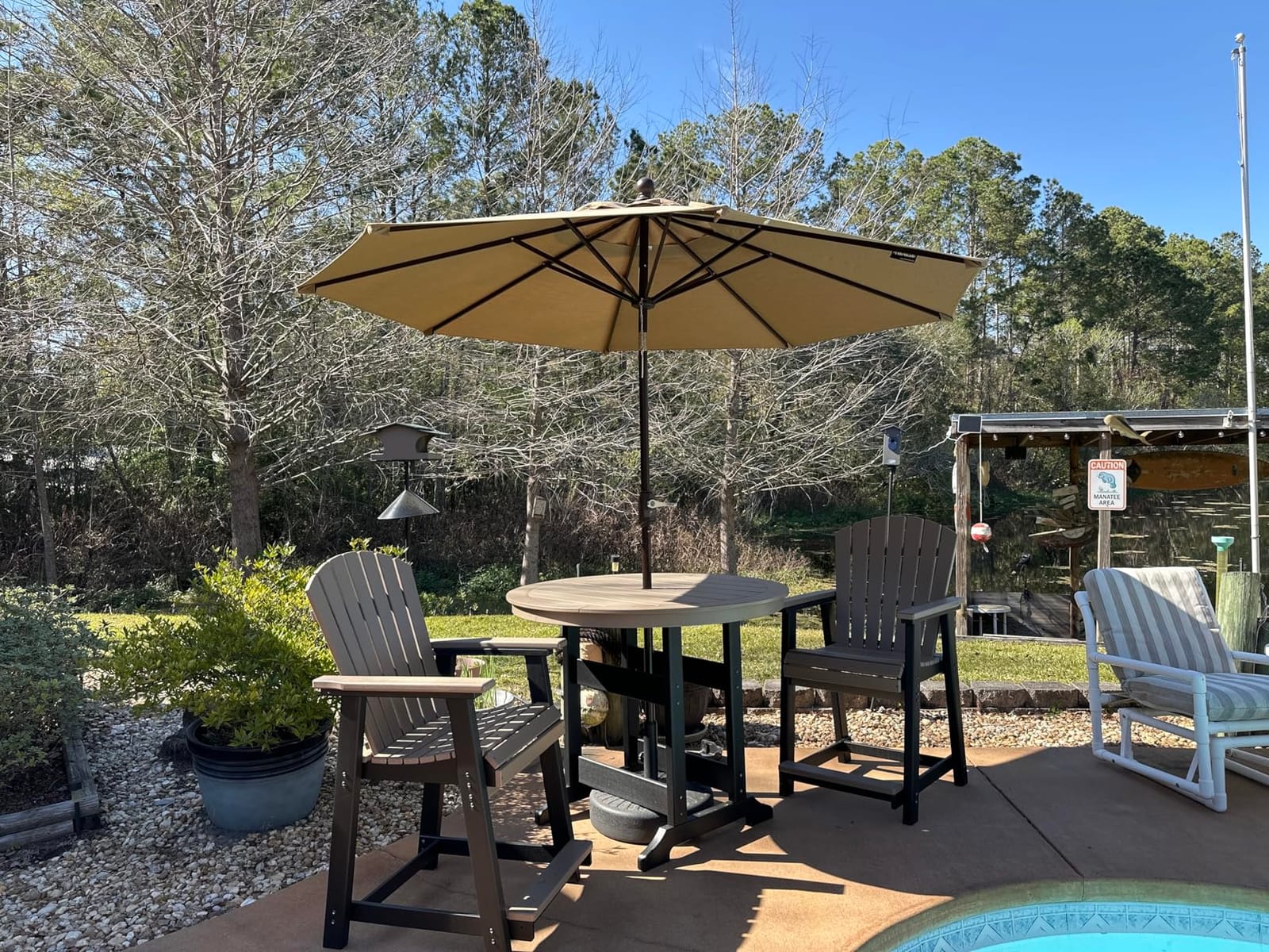 Signature Design by Ashley 1-Piece HDPE Outdoor Adirondack Chair, Driftwood | Durable weather resistant HDPE, 36-pound stationary frame, Comfortable 16.25-inch elevated seat, Sundown Treasure Series customer photo 2