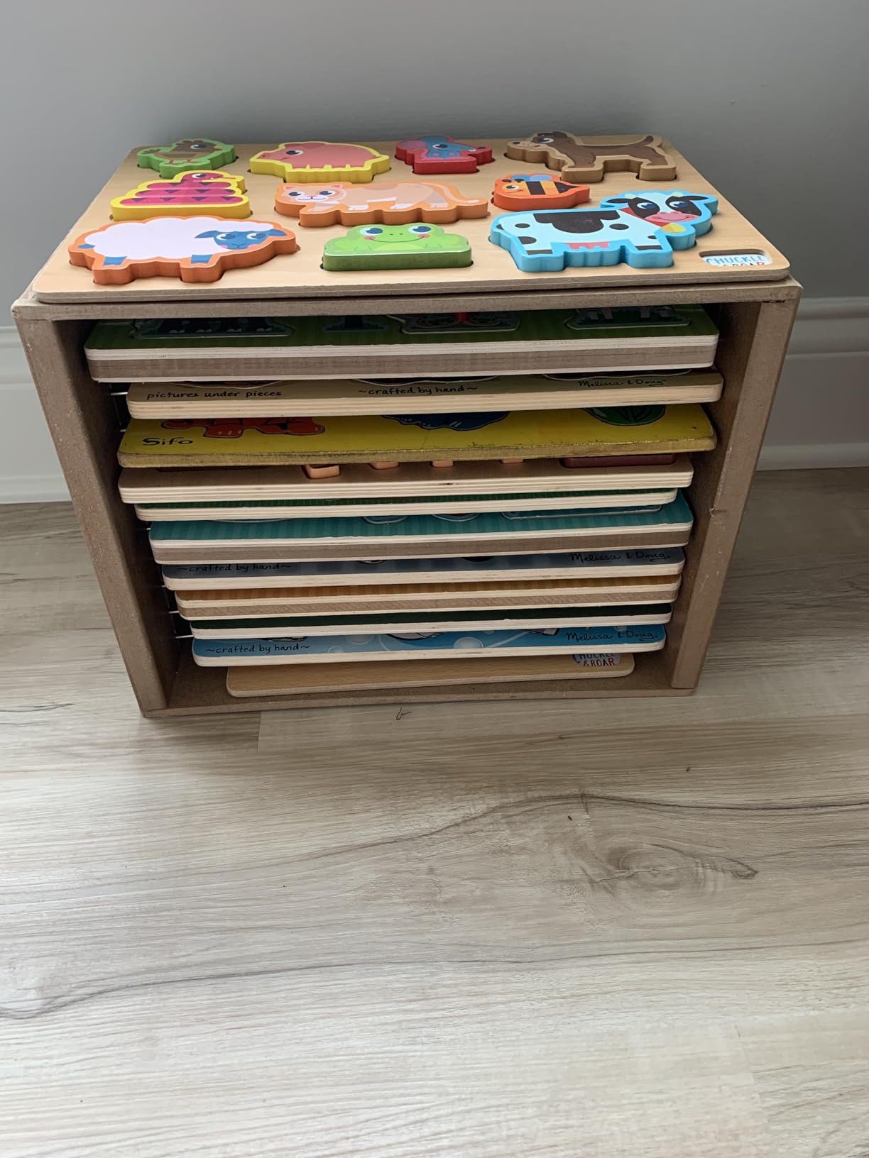 Melissa & Doug Natural Wood Puzzle Storage Case (Holds 12 Puzzles) - Wooden Puzzle Rack Organizer customer photo 1