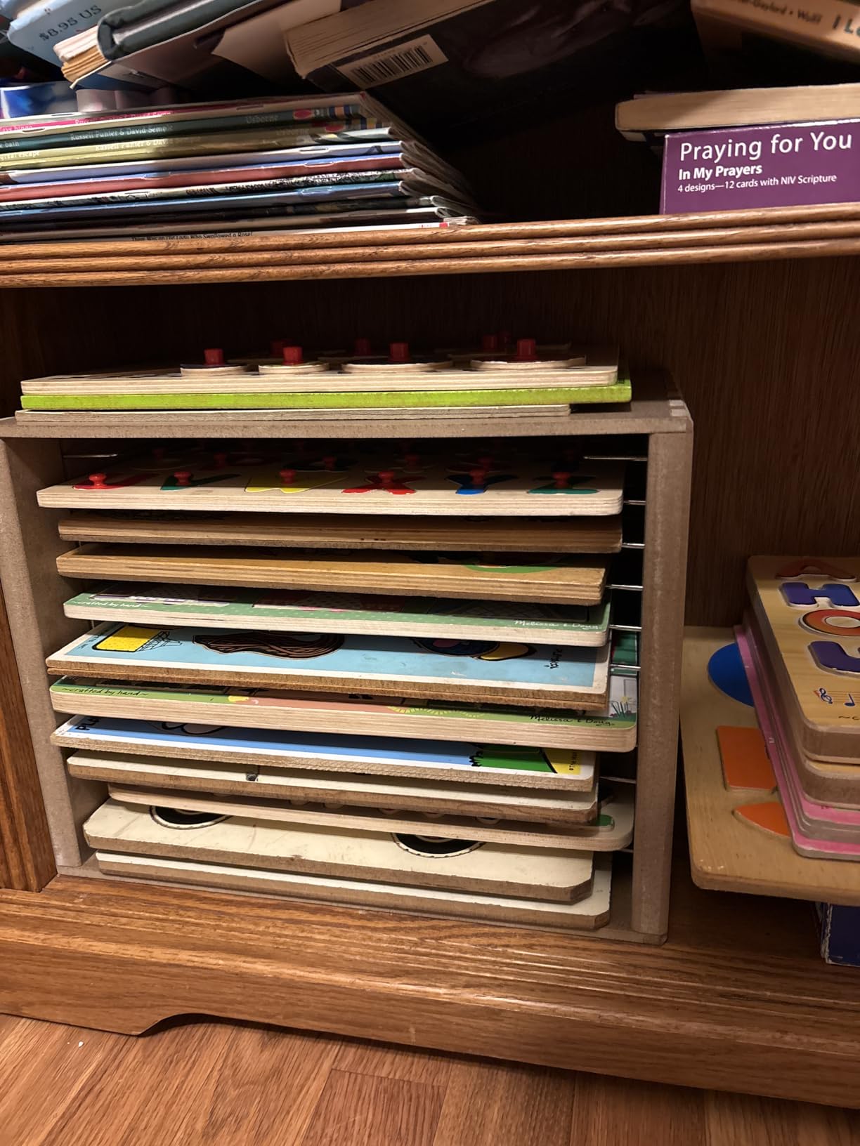 Melissa & Doug Natural Wood Puzzle Storage Case (Holds 12 Puzzles) - Wooden Puzzle Rack Organizer customer photo 2