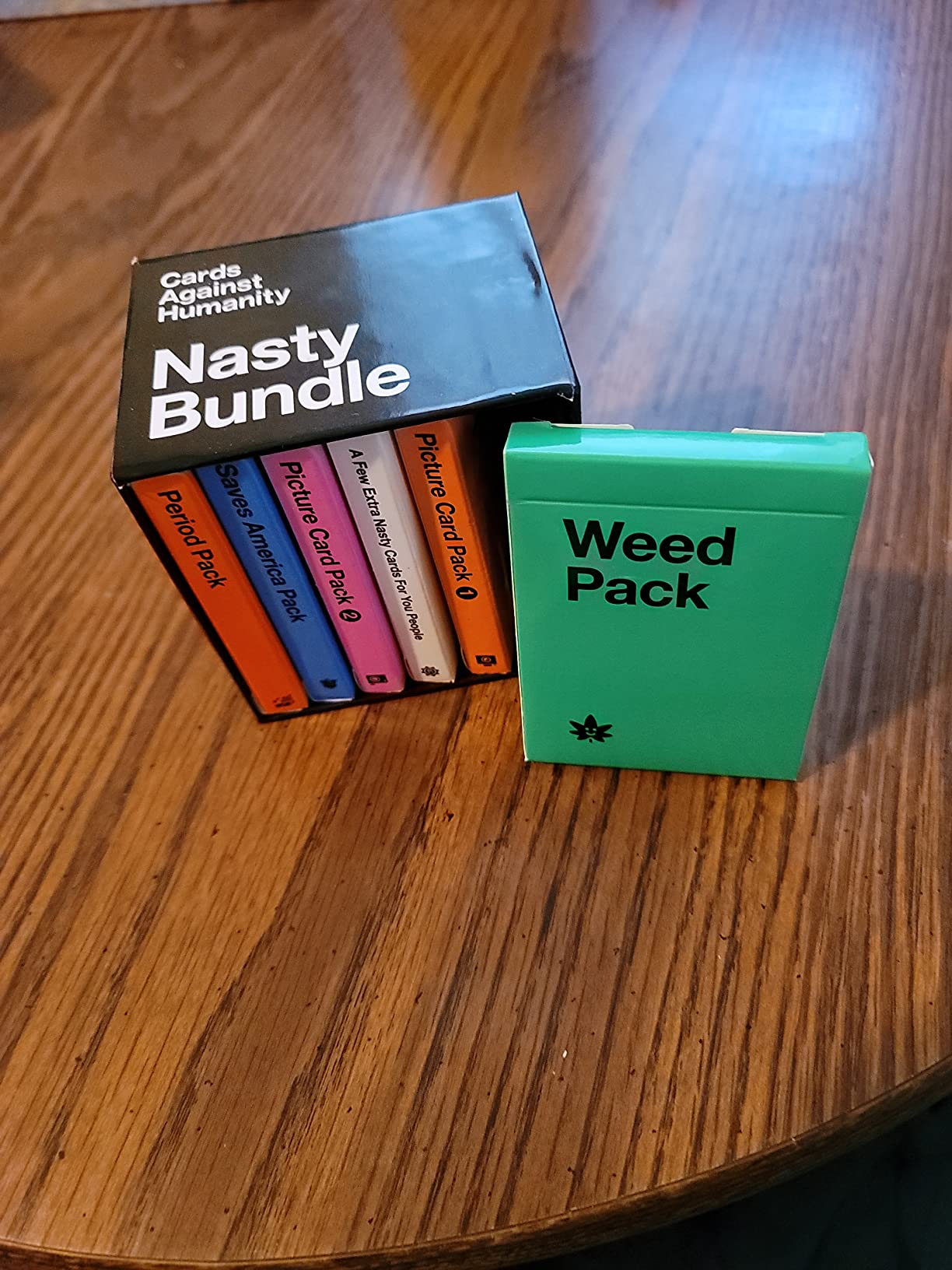 Nasty Bundle for Cards Against Humanity • 6 Extra Disgusting Themed Packs | Make everyone uncomfortable next game night. Six card game packs including the Period and Weed Packs. A nasty gift set. 17+. customer photo 2