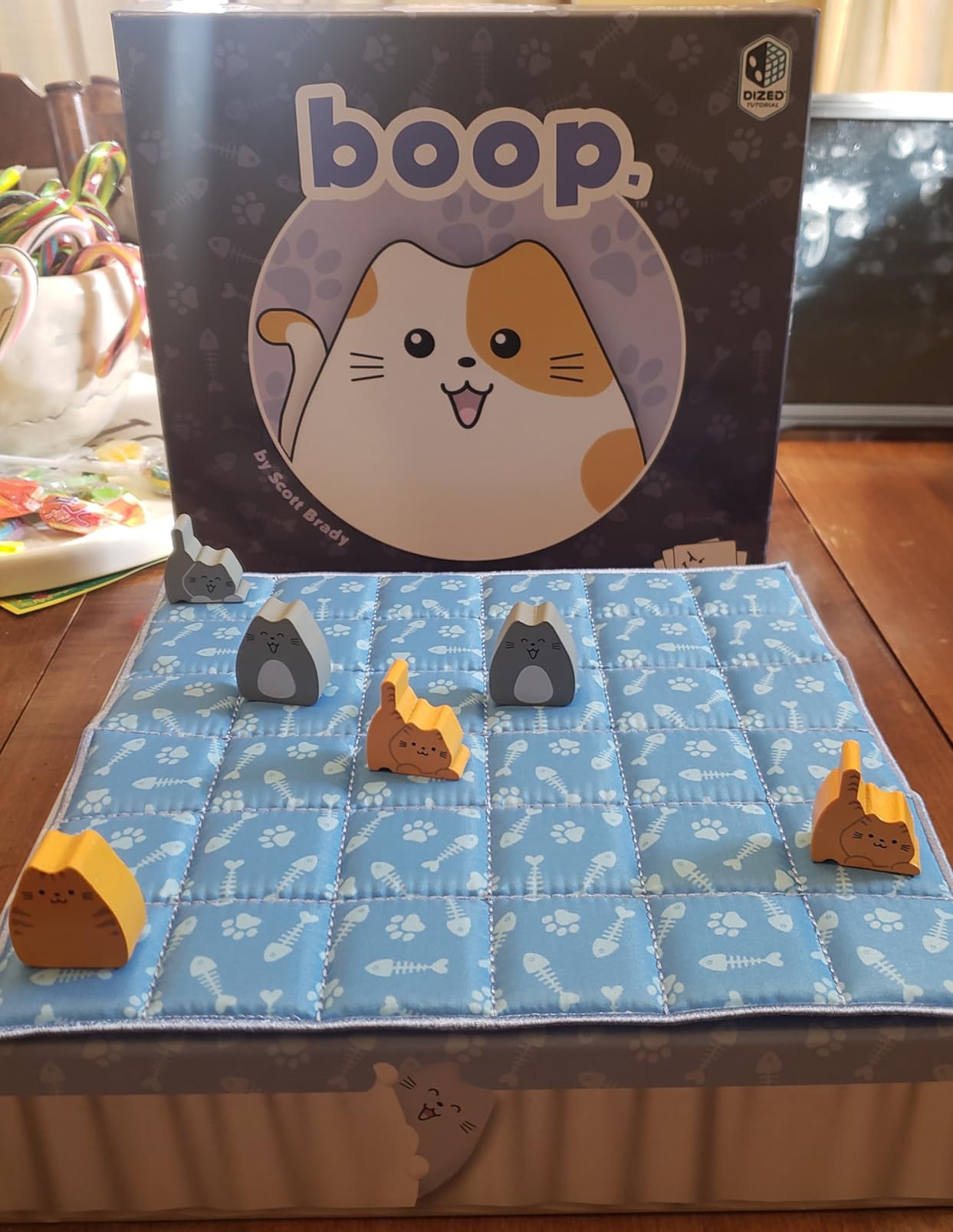 Smirk and Dagger BOOP 2-Player Cat Strategy Board Game | Place Kittens on the Quilted Bed Board Without Getting Booped Off, 32 Wooden Cat Pieces, 20-30 Minutes, Ages 10+ customer photo 1