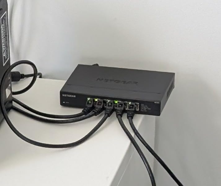 NETGEAR 5-Port 2.5G Multi-Gigabit Ethernet Unmanaged Network Switch (MS305), 5 x 2.5Gbps, Desktop or Wall Mount, Metal Case customer photo 1