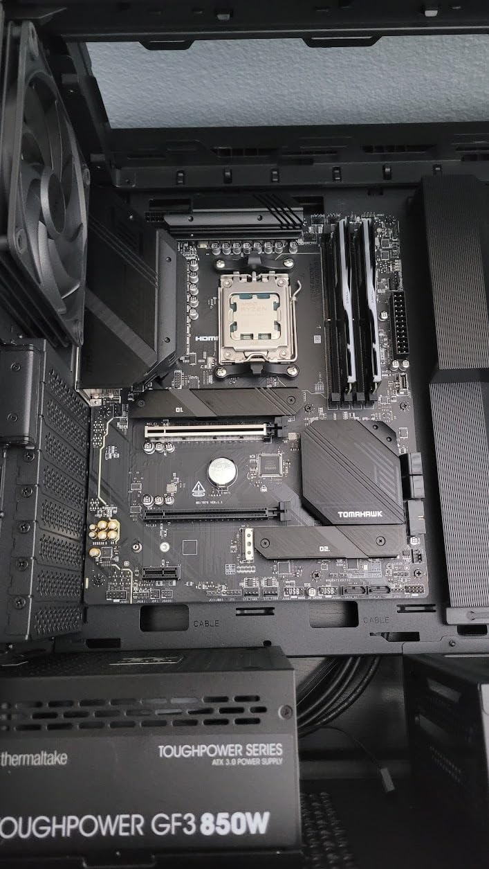 MAG B650 Tomahawk WiFi Gaming Motherboard (AMD Ryzen 9000/8000/7000 Series Processors, AM5, DDR5, PCIe 4.0, M.2, SATA 6Gb/s, USB 3.2 Gen 2, HDMI/DP, Wi-Fi 6E, Bluetooth 5.3, 2.5Gbps LAN, ATX) customer photo 2
