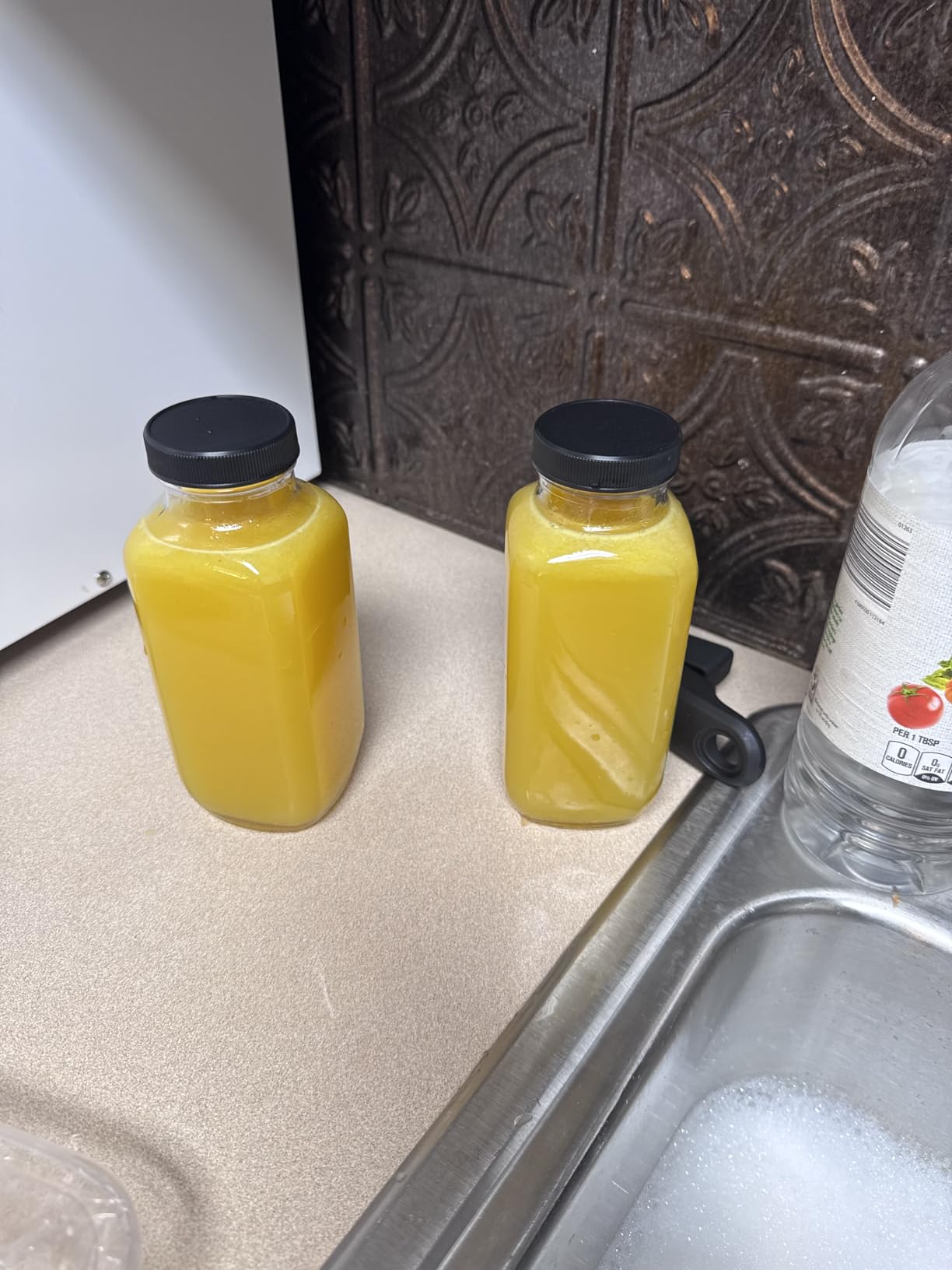 CUCUMI 10pcs 16oz Glass Juice Bottles with Lids customer photo 2
