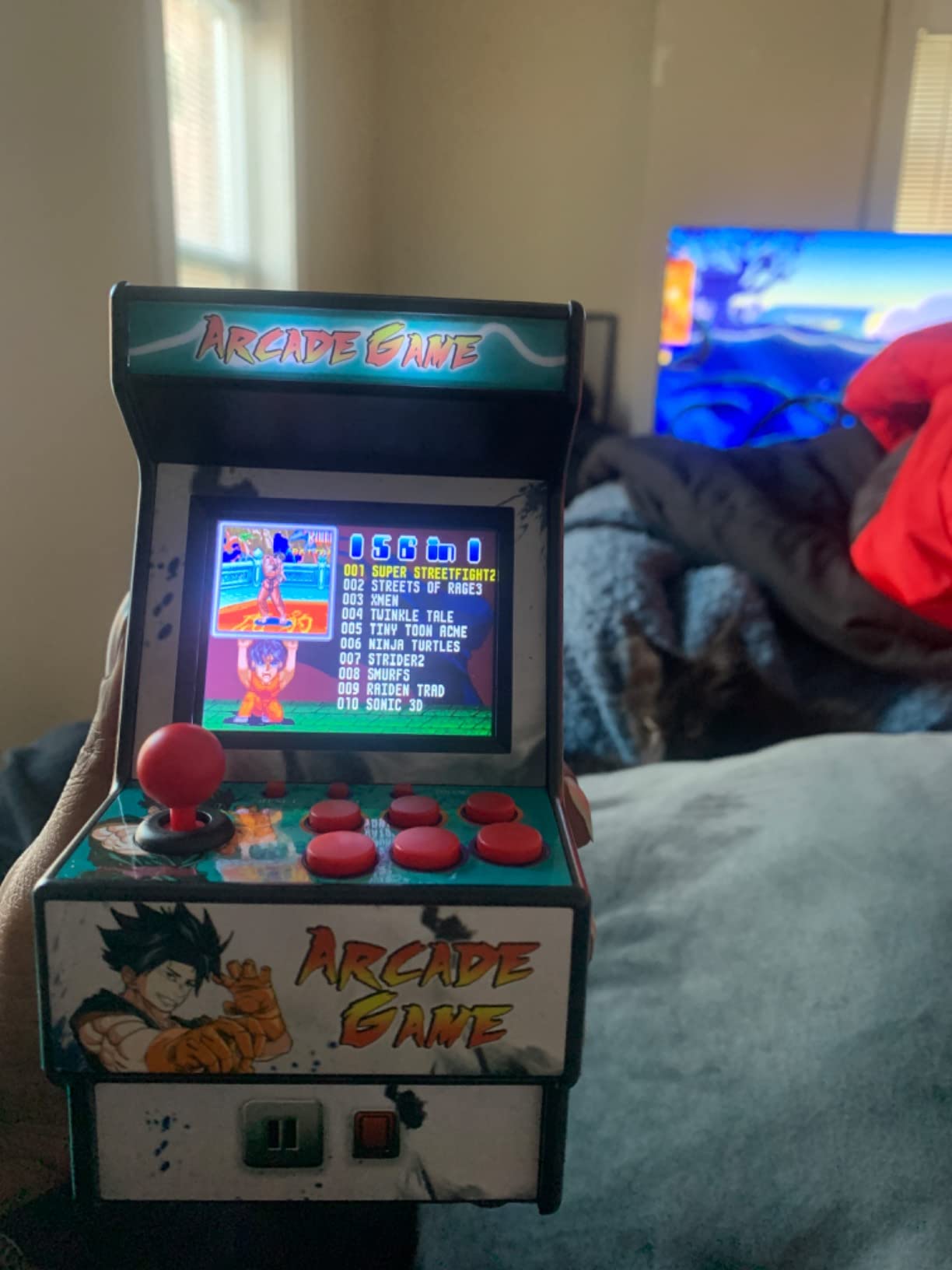 Handheld Game Console, Built in 216 Classic Retro Games, 2.8-inch Screen | Portable Mini Retro TV, Featuring 216 Single-Player Games and 84 Two-Player Games, Suitable for Children and Adults customer photo 1
