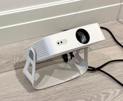 [Officially-Licensed App & Auto Focus] White Smart Mini Projector with WiFi and Bluetooth, XuanPad 4K Support Movie Projector, Portable Native 1080P Outdoor Projector with 360° Stand customer photo 1