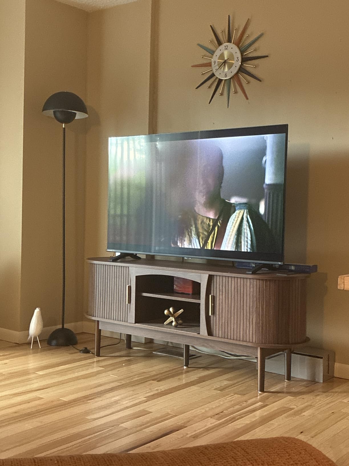 Decofy Mid Century TV Stand for TVs up to 65 Inches, Entertainment Center with Storage, Power Outlet, Fluted Sliding Doors & Adjustable Shelves, Modern Media TV Console Table for Living Room (Walnut) customer photo 2