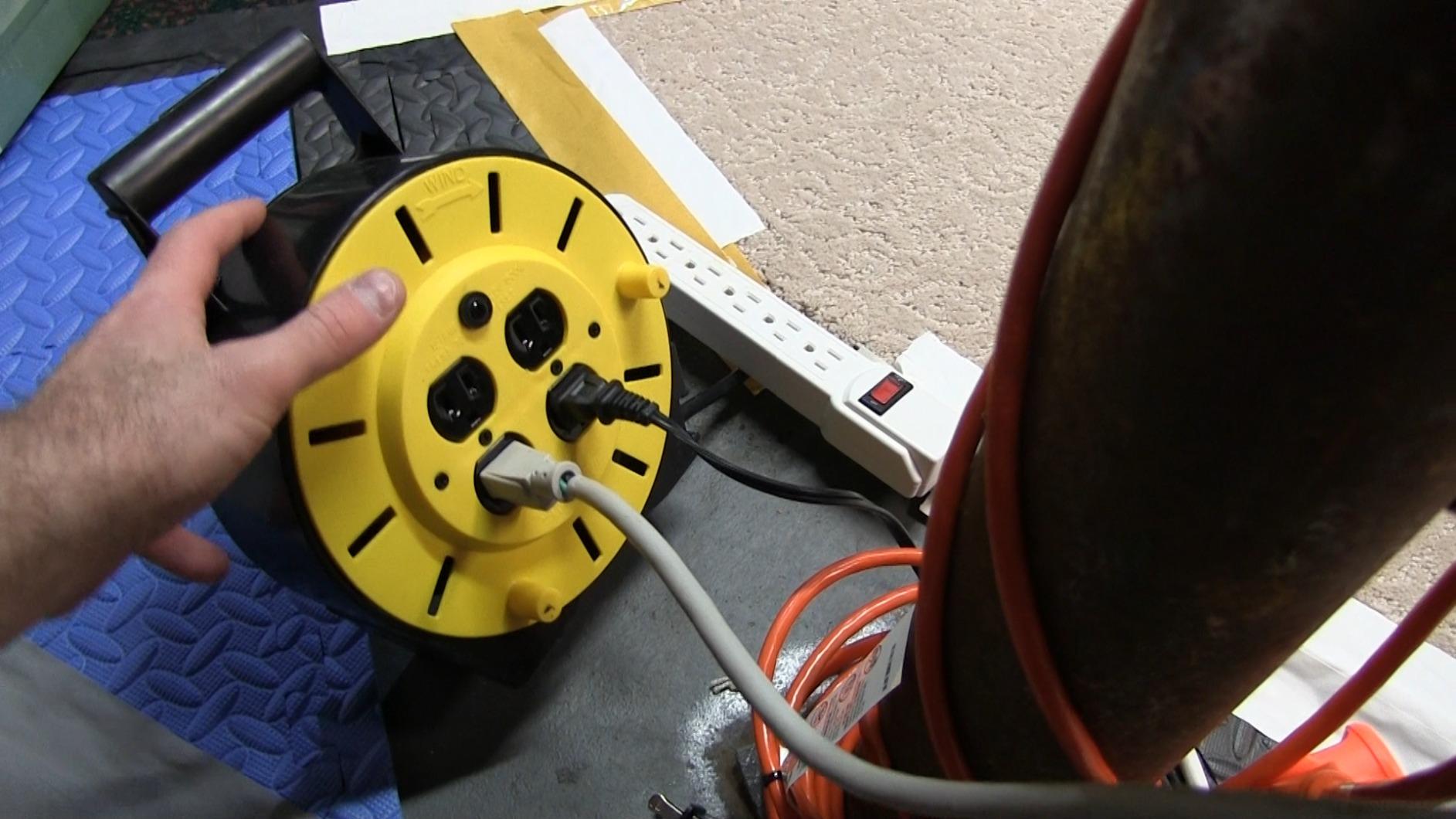 Woods Light Duty Extension Cord Reel - 16/3 Conductor Electrical Cord with 4 Grounded Outlets - 12A Circuit Breaker - Ideal for Light to Medium Duty Tools - Yellow & Black - 25 Feet customer photo 2