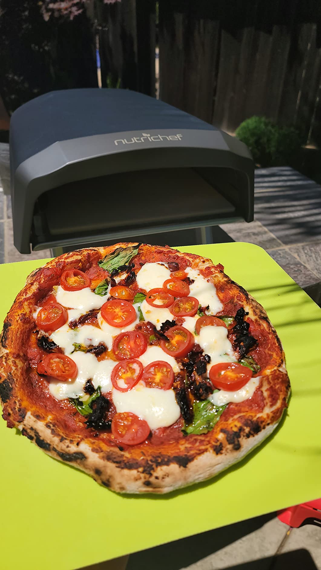 NutriChef Portable Outdoor Gas Pizza Oven - Unique Design, Easy Bake Oven with Pizza Stone, Foldable Feet, One-Touch Gas Ignition, Adjustable Heat Control, Stainless Steel, 932°F Max customer photo 1